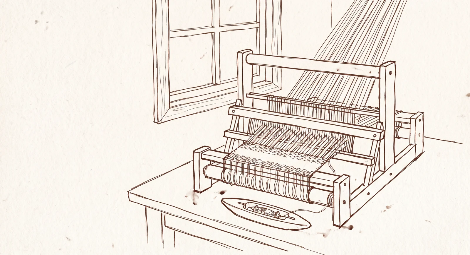 A small hand loom by a window, warp threads rising, shuttle resting on the table